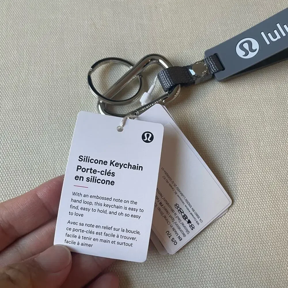 Lululemon silicone keychain - Solar Grey/Starch Blue